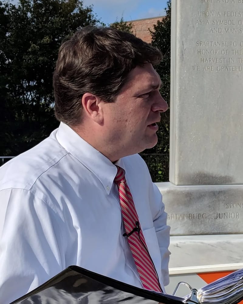 Max T. Hyde, Jr. of Hyde Law Firm, P.A., at the peach monument in downtown Spartanburg, SC