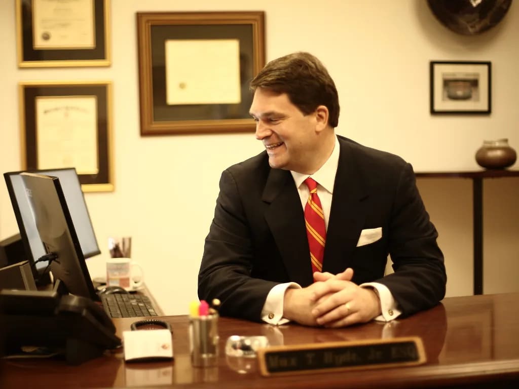 Max T. Hyde, Jr. at his desk in the Hyde Law Firm, P.A. office, Spartanburg, SC